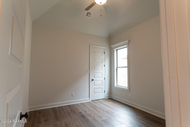 unfurnished room featuring wood-type flooring, vaulted ceiling, and ceiling fan