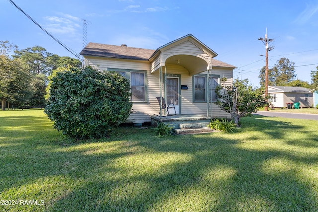 bungalow with a front lawn