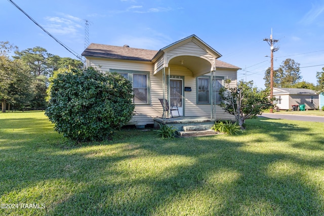 220 Saint Peter St, Lafayette, LA 70506 - view of front of home featuring a front yard