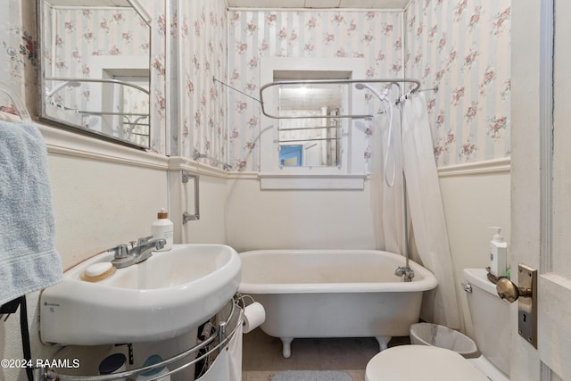 220 Saint Peter St, Lafayette, LA 70506 - full bathroom with wallpapered walls and a freestanding bath