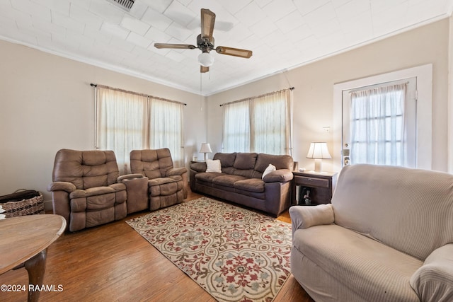 220 Saint Peter St, Lafayette, LA 70506 - living room with ceiling fan, wood finished floors, and ornamental molding