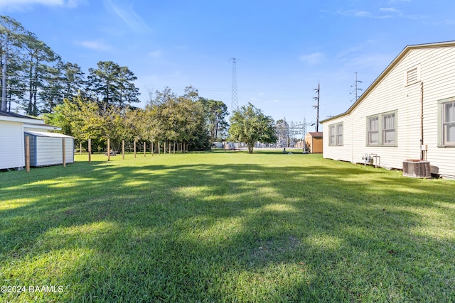 view of yard featuring central AC