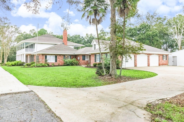 single story home featuring a garage and a front lawn