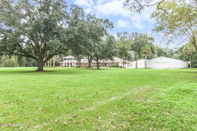 view of yard featuring a garage