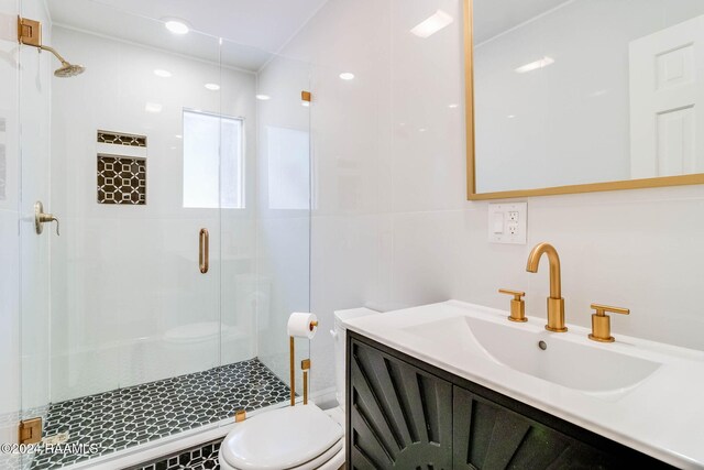 13933 Pumping Plant Rd, Abbeville, LA 70510 - bathroom featuring toilet, a shower stall, and vanity