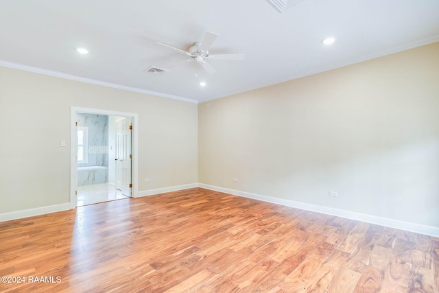 empty room with light hardwood / wood-style floors, ceiling fan, and ornamental molding