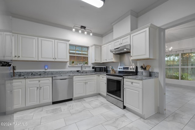 kitchen with stainless steel appliances, white cabinetry, and crown molding