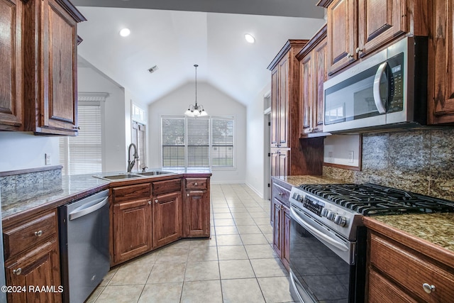 kitchen with sink, backsplash, stainless steel appliances, vaulted ceiling, and a chandelier