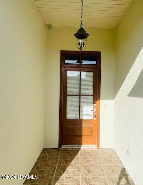 property entrance featuring french doors