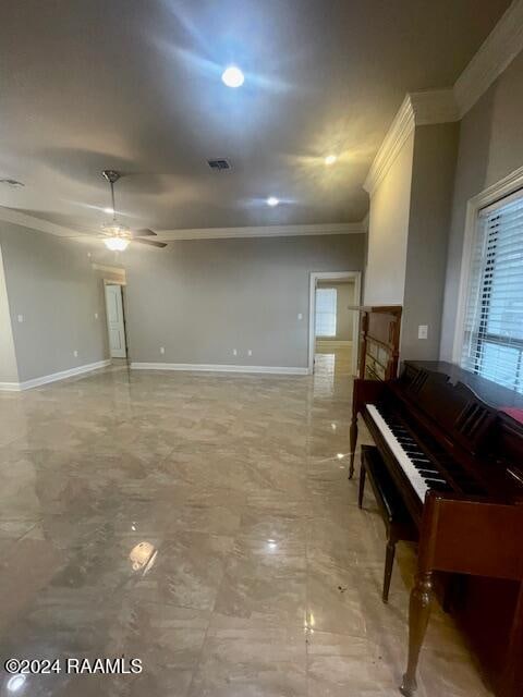 misc room featuring crown molding and ceiling fan