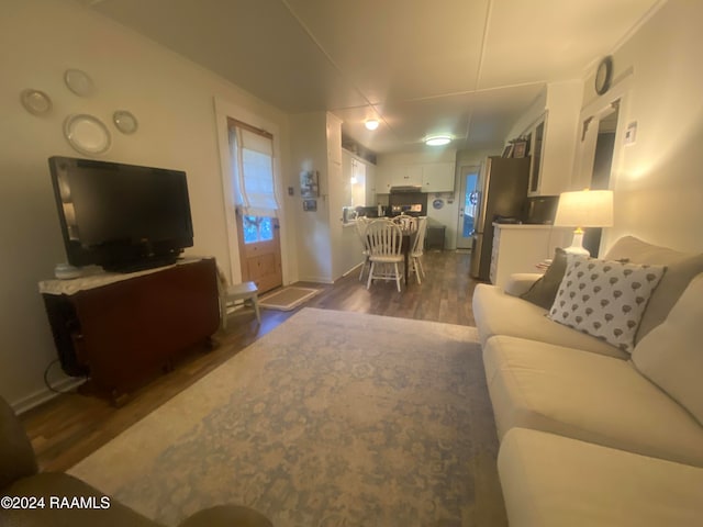 living room featuring dark hardwood / wood-style flooring