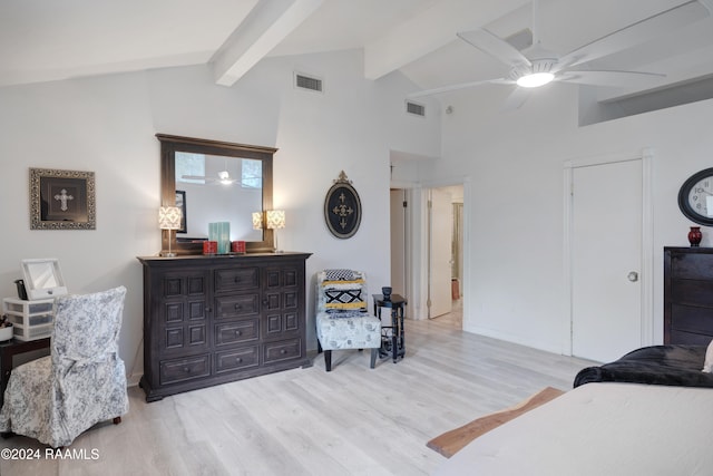 bedroom with lofted ceiling with beams, ceiling fan, and light hardwood / wood-style flooring