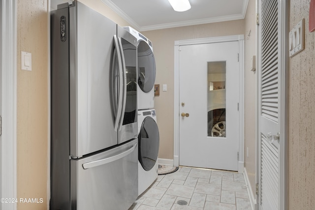 washroom with stacked washer and dryer and ornamental molding