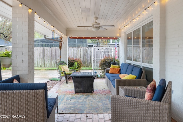 view of patio featuring an outdoor hangout area and ceiling fan