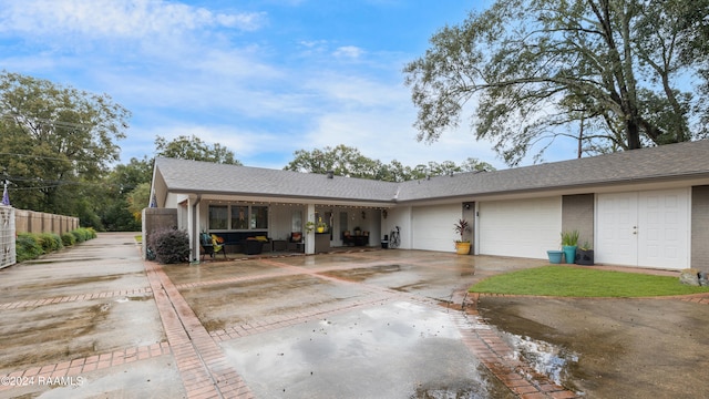 single story home with a garage