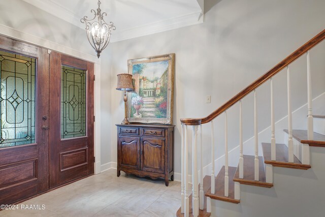 402 Old Settlement Rd, Lafayette, LA 70508 - entryway featuring crown molding, stairs, a chandelier, and baseboards