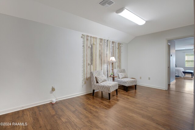 402 Old Settlement Rd, Lafayette, LA 70508 - sitting room with lofted ceiling, wood finished floors, and baseboards