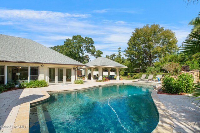 402 Old Settlement Rd, Lafayette, LA 70508 - swimming pool featuring french doors, a gazebo, and a patio