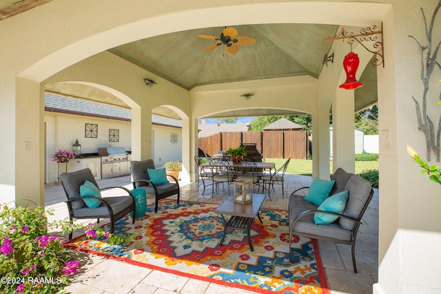 view of patio featuring a gazebo, grilling area, and ceiling fan