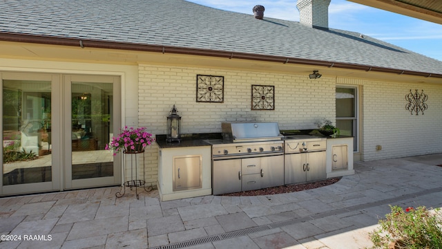 view of patio featuring area for grilling and french doors