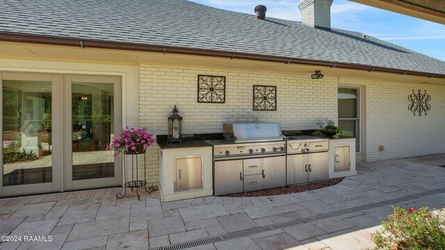 402 Old Settlement Rd, Lafayette, LA 70508 - view of patio / terrace with an outdoor kitchen and area for grilling
