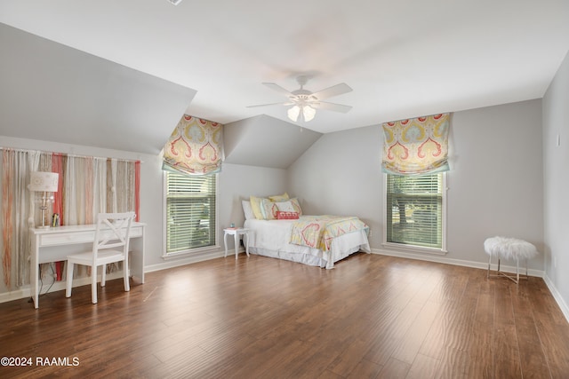 unfurnished bedroom with dark wood-type flooring, ceiling fan, and lofted ceiling