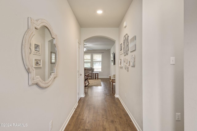 hall with dark hardwood / wood-style floors