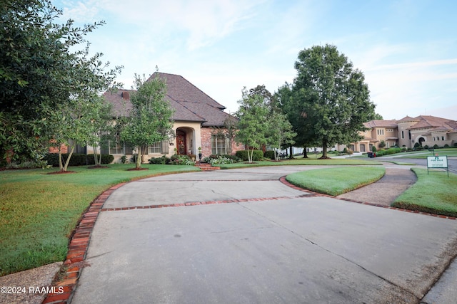 view of front of home with a front yard