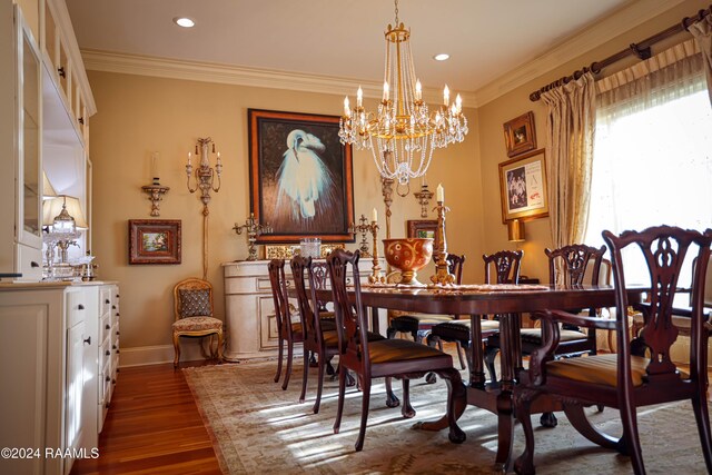 dining room featuring dark wood-style flooring, a chandelier, crown molding, recessed lighting, and baseboards