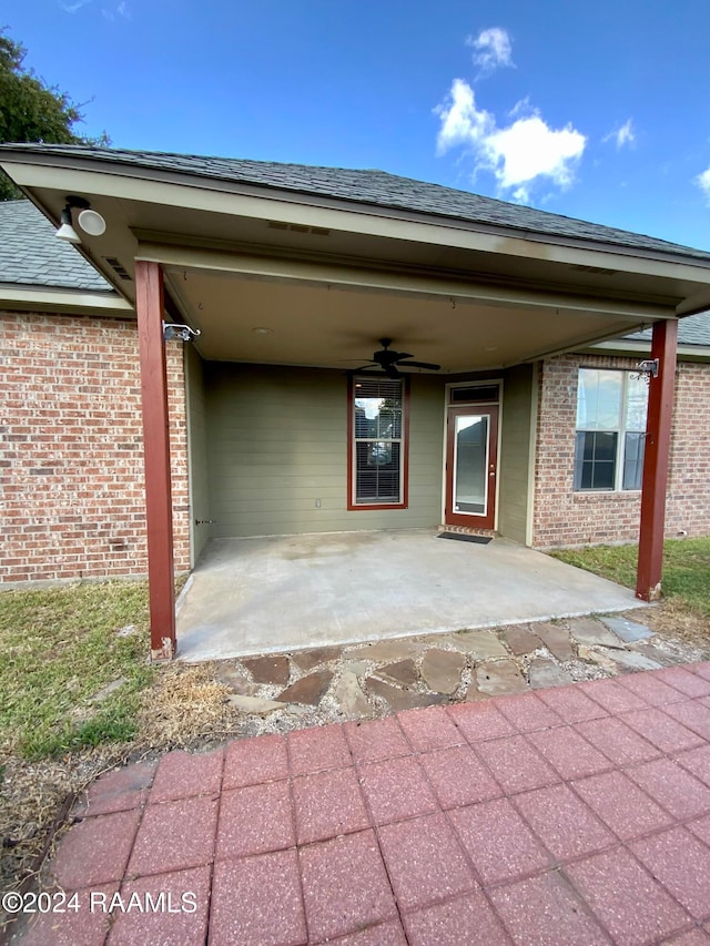 view of patio / terrace featuring ceiling fan