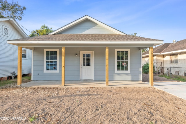 view of front of house with a patio area