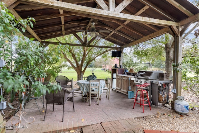 view of patio / terrace featuring a grill and a gazebo