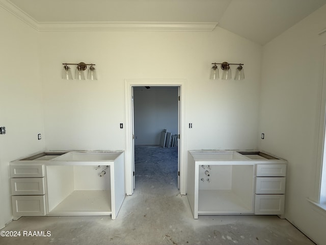 laundry area with ornamental molding