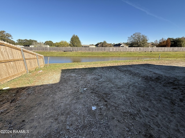 view of yard with a water view