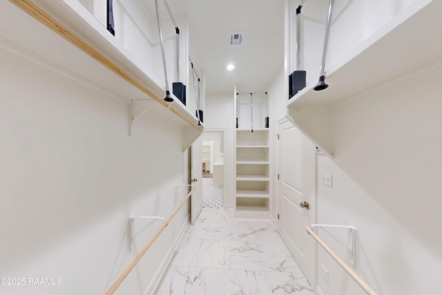 stairs featuring marble finish floor, visible vents, and recessed lighting