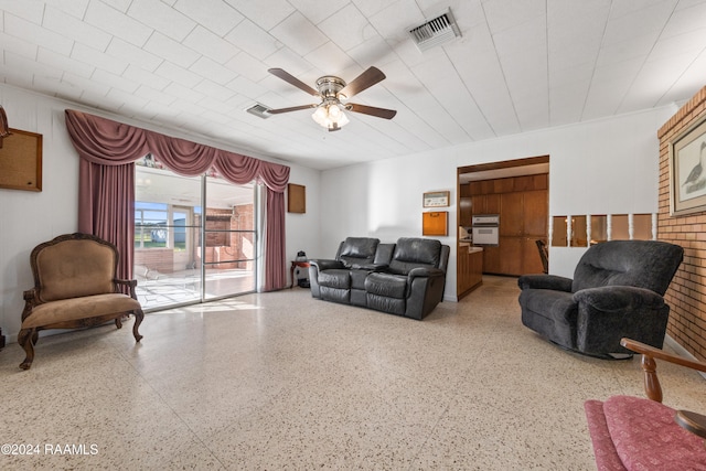 living room featuring ceiling fan