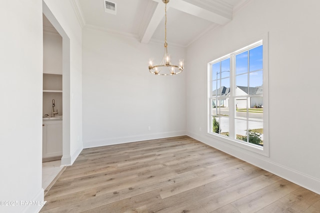 unfurnished dining area with visible vents, baseboards, beamed ceiling, an inviting chandelier, and wood finished floors