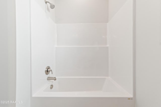 bathroom with shower / tub combination