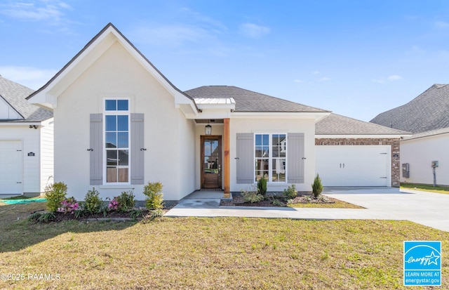 ranch-style home featuring stucco siding, concrete driveway, a garage, and a front yard