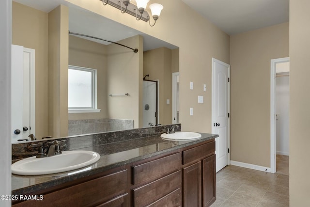 bathroom featuring tile patterned floors and vanity