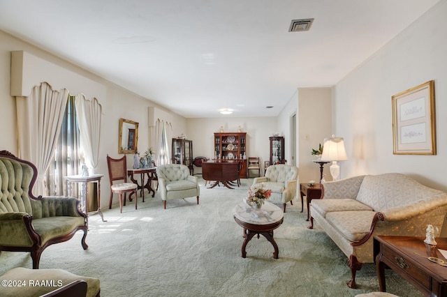 living room featuring light colored carpet