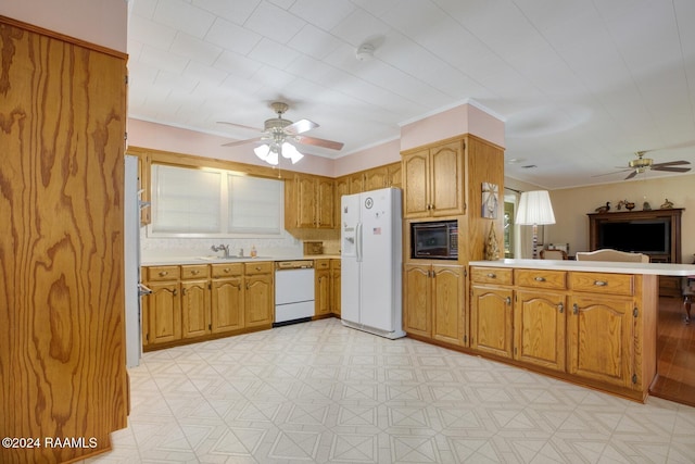 kitchen featuring sink, kitchen peninsula, white appliances, and ceiling fan