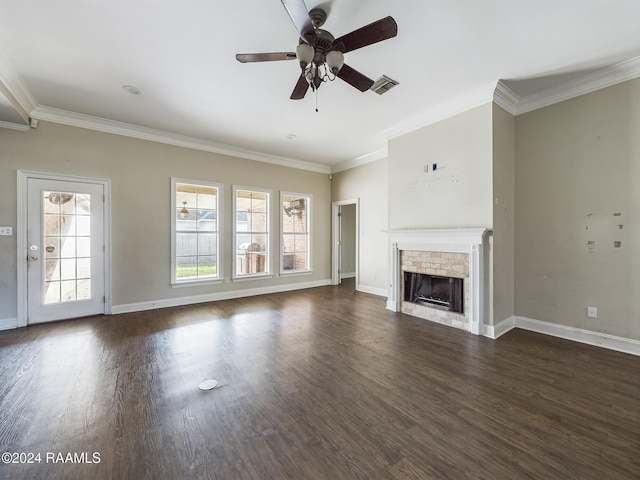 unfurnished living room featuring ornamental molding, ceiling fan, and dark wood-type flooring