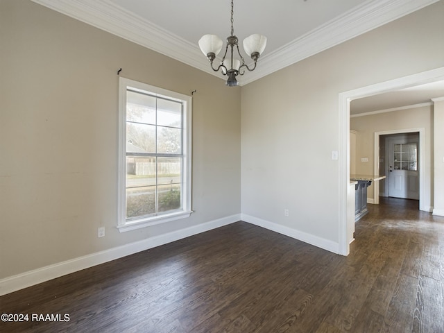 unfurnished room featuring crown molding, dark wood-type flooring, and a chandelier