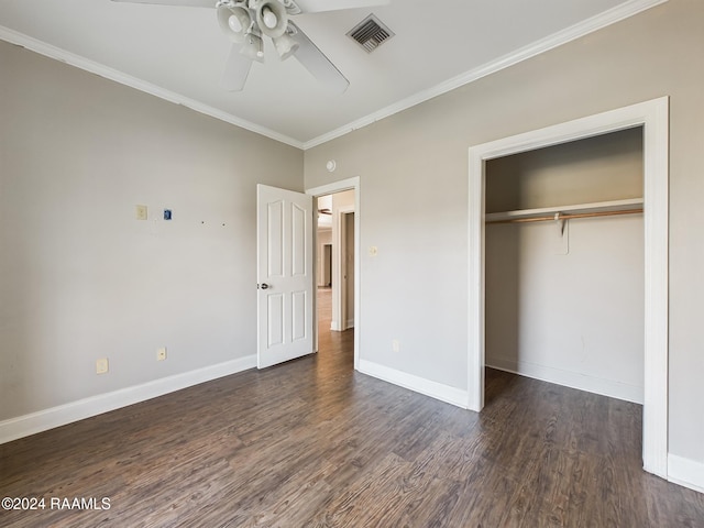 unfurnished bedroom with dark hardwood / wood-style flooring, ceiling fan, a closet, and ornamental molding