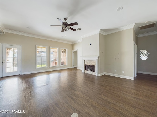 unfurnished living room featuring ceiling fan, dark hardwood / wood-style floors, and ornamental molding