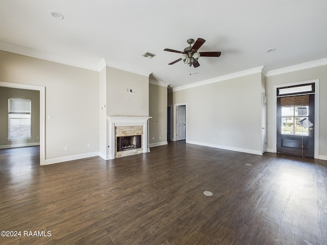 unfurnished living room featuring ceiling fan, dark hardwood / wood-style floors, and crown molding