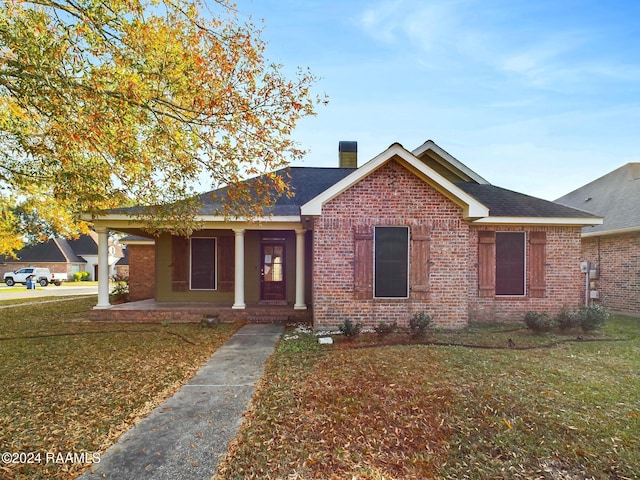 view of front of home with a front yard