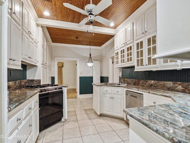 kitchen with decorative light fixtures, black gas stove, wood ceiling, sink, and white cabinets