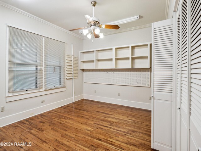 243 W Grolee St, Opelousas, LA 70570 - unfurnished dining area featuring ceiling fan, crown molding, baseboards, and wood finished floors